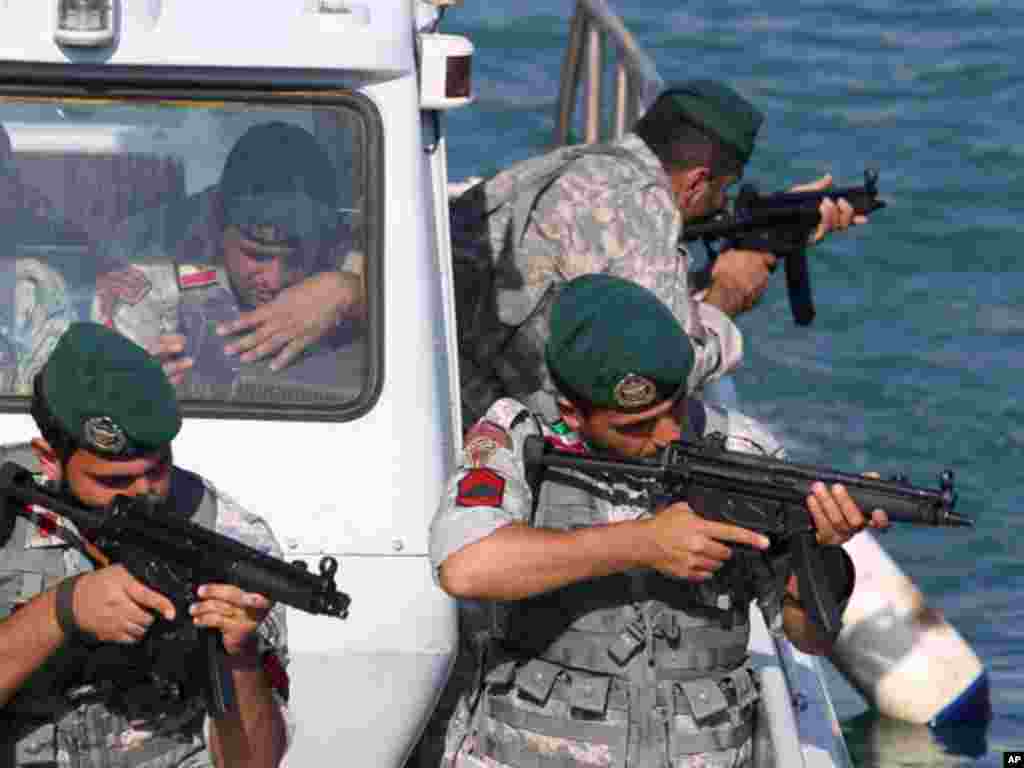 Members of the Iranian Navy participate in a drill on December 28, 2011 in the Sea of Oman. (AP)