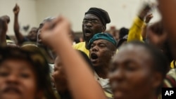 Angry residents shout after refusing to accept the replacement of Pretoria's mayoral candidate at a community center in Atteridgeville, Pretoria, South Africa, June 21, 2016.