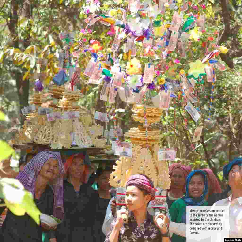Mostly the cakes are carried to the surav by the women assisted by the children. The cakes are elaborately designed with money and flowers.(Courtesy photo of DC-Cam)