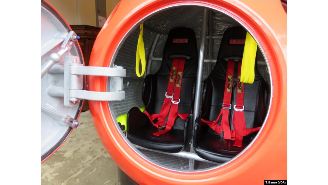 The capsule's seats have shoulder harnesses and seat belts to buckle in tight.