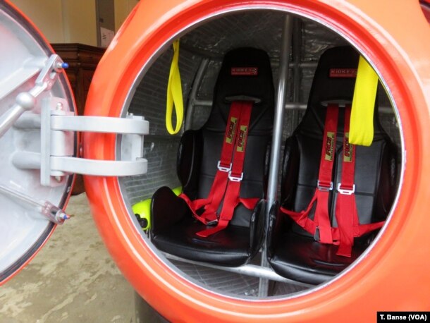 The capsule's seats have shoulder harnesses and seat belts to buckle in tight.