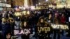 Protesters demonstrate in Lower Manhattan in New York City, demanding justice for the death of Eric Garner, Dec. 4, 2014. 