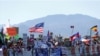 Protesters line one side of a roadway leading to Sunnylands where U.S. President Barack Obama prepares to host leaders from Southeast Asia at the ASEAN Summit in Rancho Mirage, California, Feb. 15, 2016. 