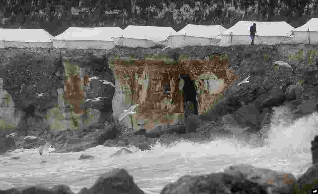 Migrant and refugee tents are set up in a new makeshift camp along the cliffs at the port of Dieppe, northern France.