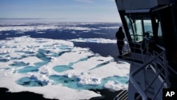 The Finnish icebreaker MSV Nordica sails through ice floating on the Chukchi Sea off the coast of Alaska, July 16, 2017, while traversing the Arctic's Northwest Passage.