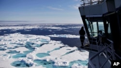 The Finnish icebreaker MSV Nordica sails through ice floating on the Chukchi Sea off the coast of Alaska, July 16, 2017, while traversing the Arctic's Northwest Passage.