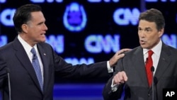 Romney i Perry tijekom debate u Las Vegasu