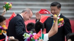ཏུར་ཀིའི་སྲིད་འཛིན་དང་ཡུ་གུར་བའི་བདེ་སྡུག