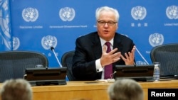 FILE - Vitaly Churkin, Russia's ambassador to the United Nations, speaks during a news conference at U.N. headquarters in New York.