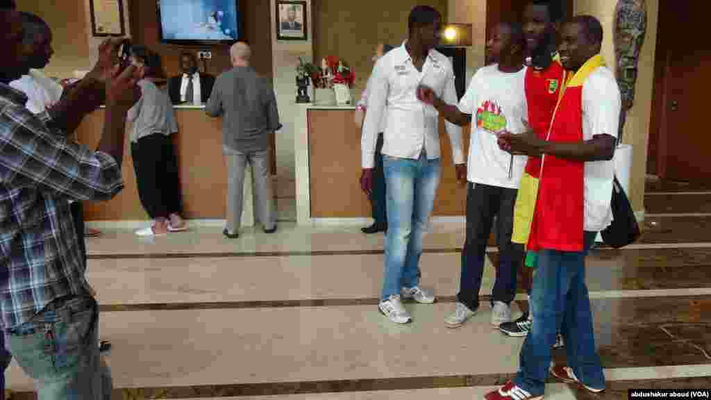 Fans with Guinea Conakry striker in Malabo