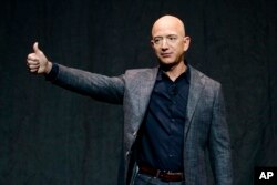 Jeff Bezos speaks at an event before unveiling Blue Origin's Blue Moon lunar lander, May 9, 2019, in Washington.