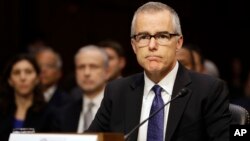 Acting FBI Director Andrew McCabe listens on Capitol Hill in Washington, May 11, 2017, while testifying before a Senate Intelligence Committee hearing on major threats facing the U.S. 
