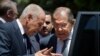 FILE - Russian Foreign Minister Sergey Lavrov, right, listens to Arab League Secretary-General, Ahmed Aboul Gheit, as he departs the Arab League headquarters after meetings, in Cairo, Egypt, Monday, May 29, 2017.