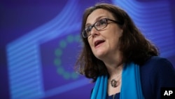 In this file photo taken on April 15, 2019, European Trade Commissioner Cecilia Malmstrom talks to journalists during a news conference at the European Commission headquarters in Brussels.