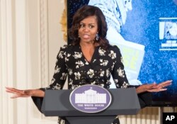 First Lady Michelle Obama hosts a special screening with the U.S. State Department's Office of Global Women's Issues of the new CNN Film "We Will Rise: Michelle Obama’s Mission to Educate Girls Around the World," at the White House in Washington, Oct. 11, 2016.