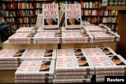 FILE - Copies of the book "Fire and Fury: Inside the Trump White House" by author Michael Wolff are seen at the Book Culture bookstore in New York, Jan. 5, 2018.