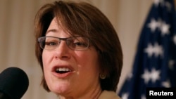 FILE - U.S. Senator Amy Klobuchar, a Democrat from Minnesota, delivers remarks at the public launch of the U.S. Agriculture Coalition for Cuba at the National Press Club in Washington, Jan. 8, 2015. 