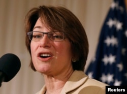 FILE - U.S. Sen. Amy Klobuchar, D-Minn., delivers remarks at the public launch of the U.S. Agriculture Coalition for Cuba at the National Press Club in Washington, Jan. 8, 2015.