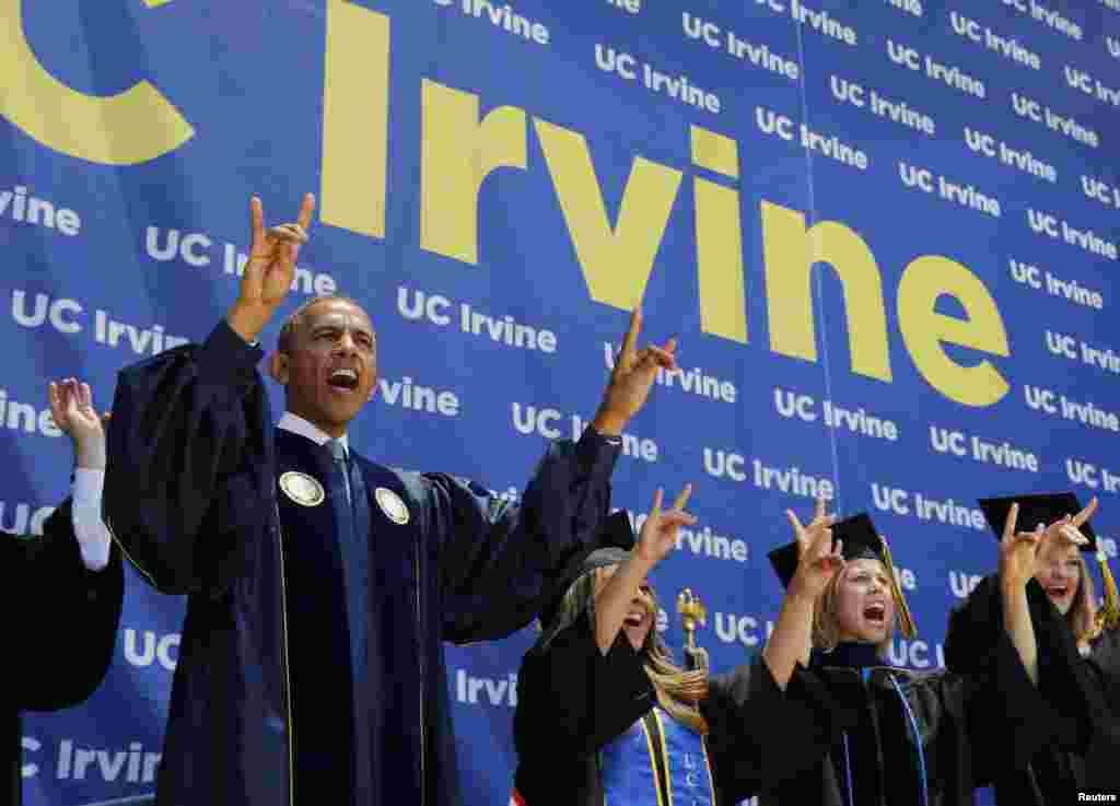 U.S. President Barack Obama yells &quot;Zot! Zot! Zot!&quot; to honor the school mascot, the anteater, as he attends the commencement ceremony for the University of California, Irvine at Angels Stadium in Anaheim, California, June 14, 2014.