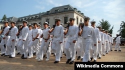 FILE - U.S. Naval Academy midshipmen participate in a formal parade on the school's campus in 2010. (U.S. Navy photo)