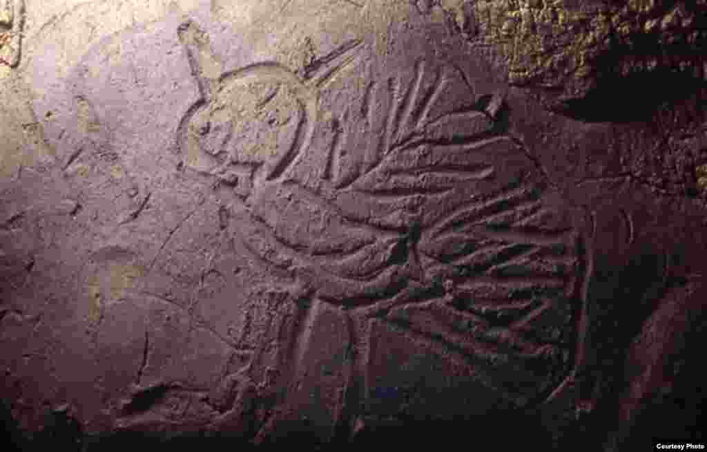 The owl seen here was carved in mud by the native ancient peoples of Tennessee. Some Native American peoples in the southeastern United States associated mud with the origin of the world. (Photo Credit: Jan Simek, Alan Cressler, Nicholas Herrmann and Sarah Sherwood / Antiquity Publications LTD.)