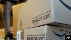 Des colis en voie d’être acheminés à partir du dépôt d'Amazon.com à Palo Alto, en Californie, le 30 juin 2011.