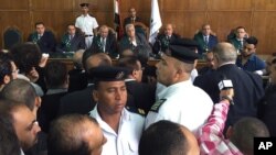 Chief government lawyer, Rafiq Omar(c) at an appeals court hearing in Cairo, Egypt. Egypt's government on Sunday defended its decision to hand over two Red Sea islands to Saudi Arabia at after the move was struck down by a lower court last week.
