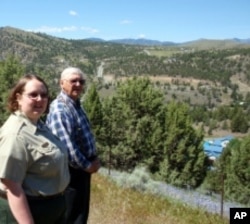 Christina Sweet and Dennis Smith overlook a likely location for the vanished Canyon City Chinese Cemetery in Grant County, Oregon.