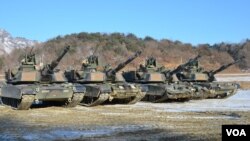 M1-A2SEP Abrams tanks participating in a platoon qualifying exercise near the DMZ. (Photo: VOA / Steve Herman) 