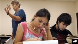 Students at the University of Texas-Southmost College work on a writing assignment in an English as a Second Language class in 2006.