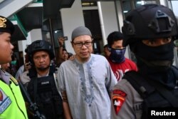 Salah seorang pimpinan Jemaah Ansharut Daulah (JAD), Zainal Anshori, saat hadir di Pengadilan Negeri Jakarta Selatan 31 Juli 2018. (Foto: Antara)