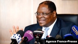 FILE - South Africa's Deputy Chief Justice Raymond Zondo, head of an investigation commission into corruption allegations at the highest levels of the state, holds a press conference on Jan. 23, 2018 in Midrand, South Africa.