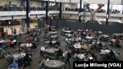 Students eat and study in one of several dining halls at the Brigham Young University campus in Provo, Utah.