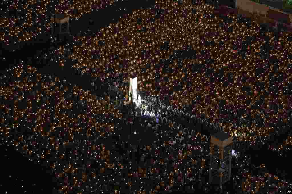 Tens of thousands of people attend a candlelight vigil at Victoria Park in Hong Kong to mark the Chinese governement&#39;s suppression of the 1989 student-led Tiananmen Square protests in Beijing.