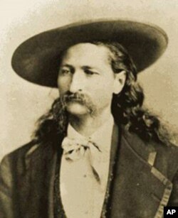 Wild Bill Hickok was holding the dead man's hand - two aces and two eights - when Jack McCall walked up and shot him dead to avenge, he said, Hickok's murder of McCall's brother.