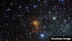 This new picture from the VLT Survey Telescope (VST) at ESO's Paranal Observatory shows the remarkable super star cluster Westerlund 1 (eso1034). This exceptionally bright cluster lies about 16 000 light-years from Earth in the southern constellation of A