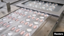 ARHIVA - Fajzerova pilula protiv Kovida 19 (Foto: Reuters/Pfizer)