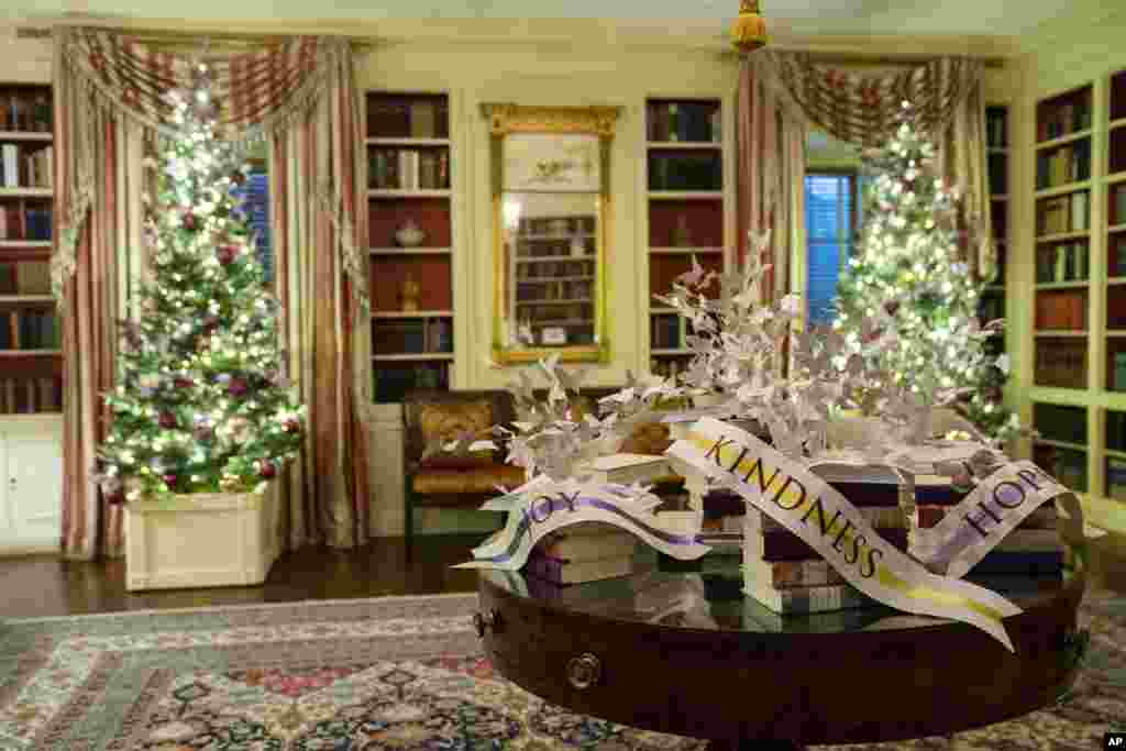 The Vermeil Room of the White House is decorated for the holidays during a press event for the White House holiday decorations, Monday, Nov. 29, 2021, in Washington. (AP Photo/Evan Vucci)