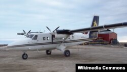 FILE - A de Havilland Twin Otter DHC-6 plane, similar to the one in this file photo, is missing in eastern Indonesia.