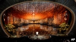 Host Chris Rock speaks at the Oscars on Sunday, Feb. 28, 2016, at the Dolby Theatre in Los Angeles.