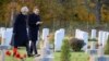 British Prime Minister Theresa May and French President Emmanuel Macron visit the Thiepval cemetery as part of ceremonies to mark the centenary of the 1918 Armistice, in Thiepval, northern France, Nov. 9, 2018. 