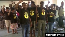 'We are the only free African country that still has a colonial name,' says AZAPO's leader. Members sing protest songs at a recent Johannesburg meeting. (Courtesy AZAPO)