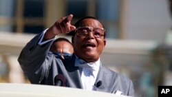 Minister Louis Farrakhan speaks during a rally to mark the 20th anniversary of the Million Man March in Washington, Oct. 10, 2015.