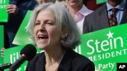 FILE - In this Oct. 24, 2011 file photo, Jill Stein of Lexington, Mass. speaks during a news conference outside the Statehouse in Boston. Stein, a medical doctor who once ran against Mitt Romney for governor of Massachusetts says she has enough delegates