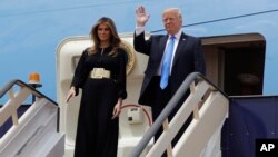 President Donald Trump and first lady Melania Trump arrive at the Royal Terminal of King Khalid International Airport, May 20, 2017, in Riyadh. 