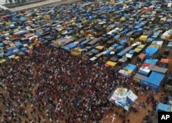 n this Tuesday, Dec. 12, 2017 photo, people who live in the squatter community coined "Povo Sem Medo," or Fearless People meet to discuss their future in Sao Bernardo do Campo, a suburb of Sao Paulo, Brazil.