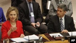 US Secretary of State Hillary Rodham Clinton addresses a UN Security Council meeting on women; Austria's Foreign Minister Michael Spindelegger is on the right, 26 October 2010