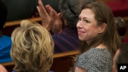 FILE - Democratic presidential candidate Hillary Rodham Clinton, left, and her daughter, Chelsea, attend the Foundry United Methodist Church for their Bicentennial Homecoming Celebration, in Washington, Sept. 13, 2015.