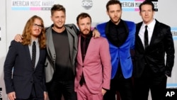 FILE - OneRepublic arrives at the 39th Annual American Music Awards in Los Angeles. 