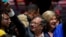 Former rebel Gustavo Petro and his wife Veronica Alcocer celebrate before supporters after winning a runoff presidential election in Bogota, Colombia, June 19, 2022.